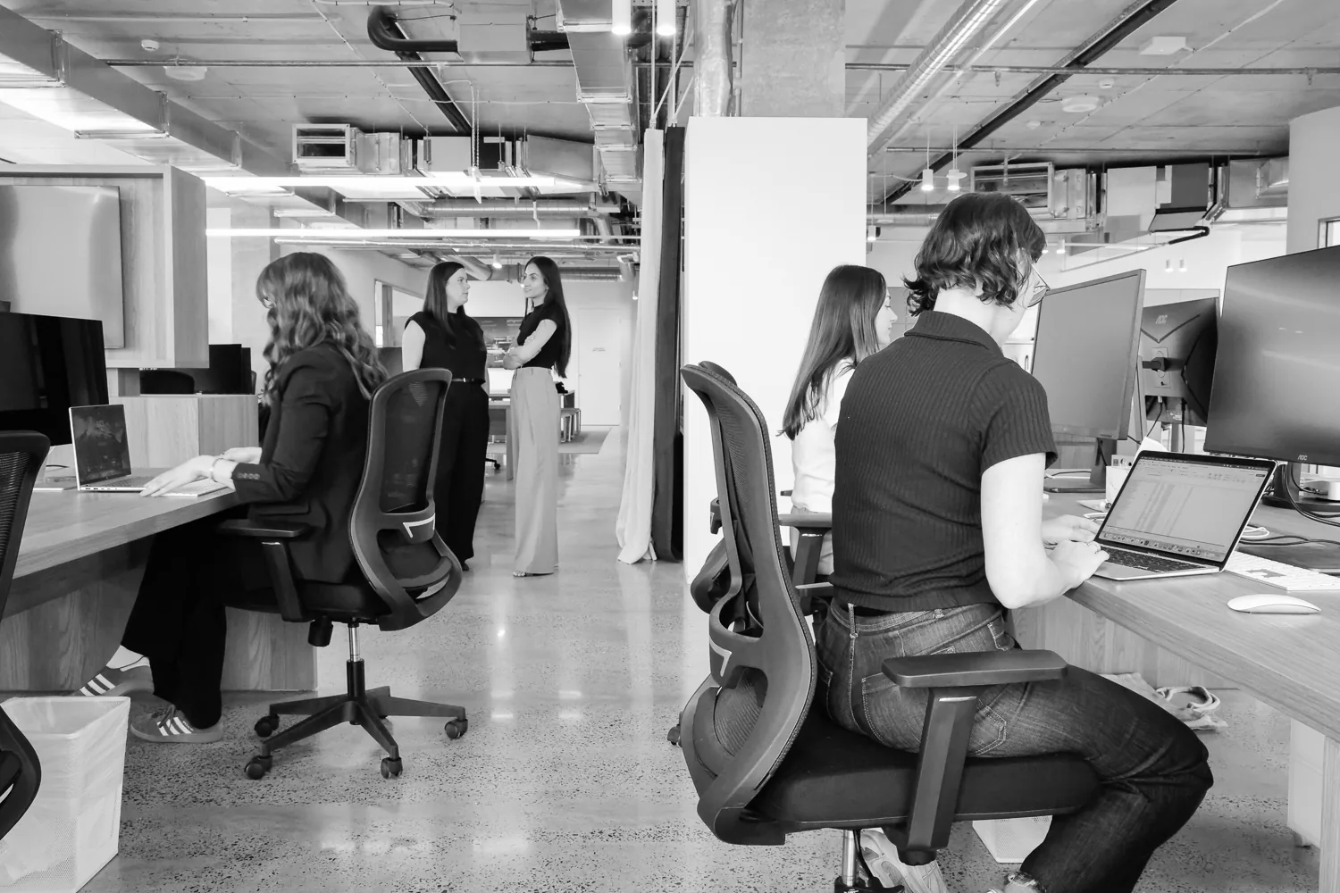 The Customr team working in the office