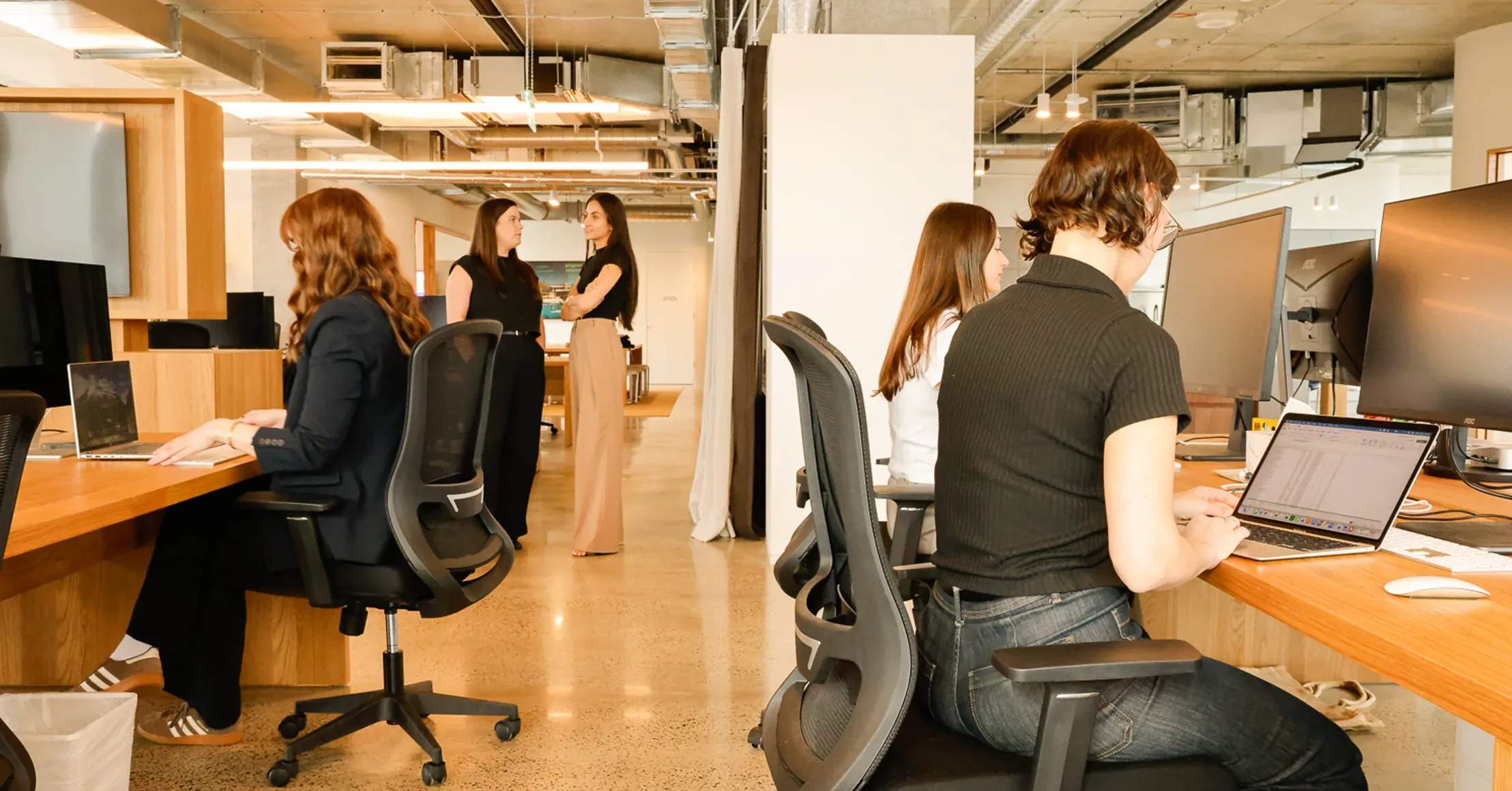 Customr team working at their desks