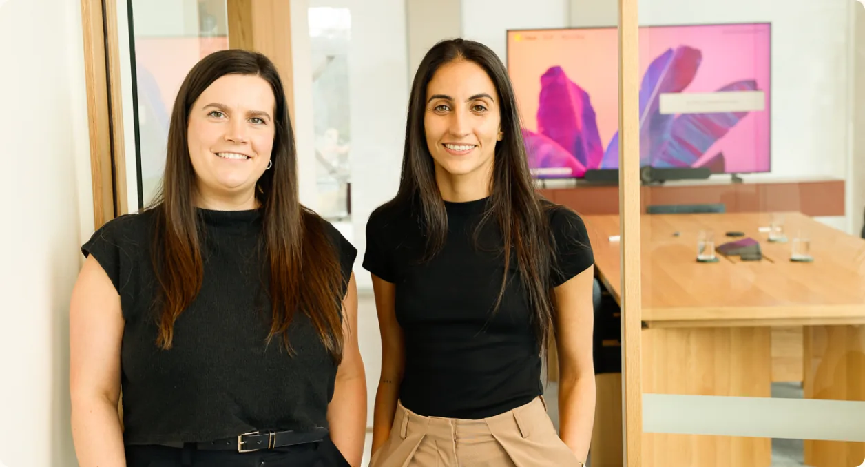 Stephanie Mitchell and Soha Hosseini in the Customr office