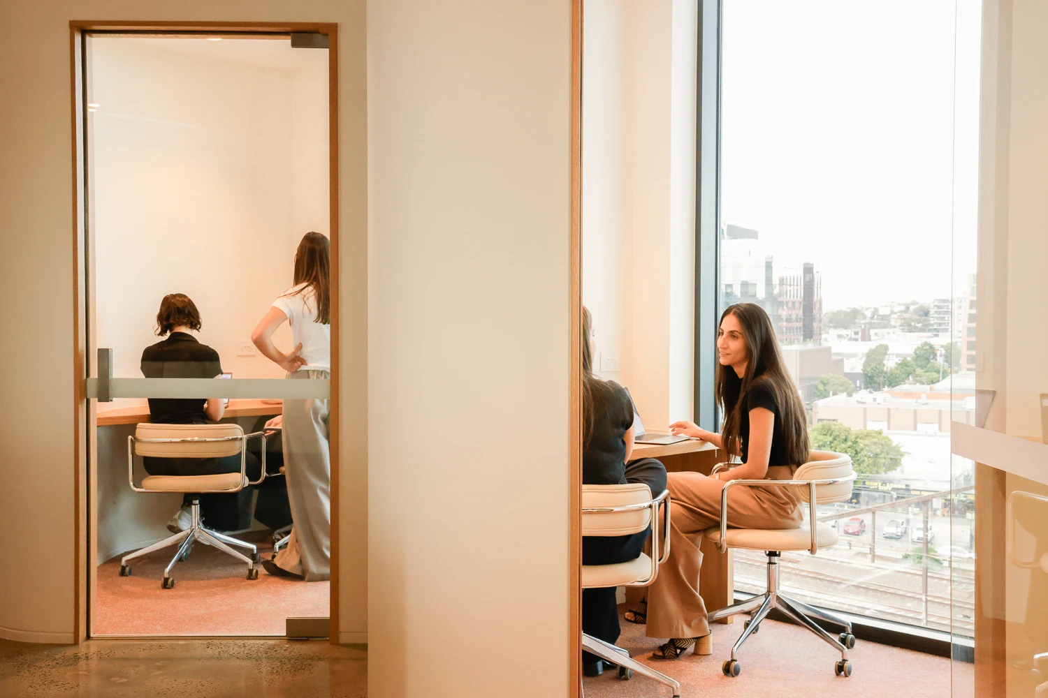 Customr team seen through the meeting room glass